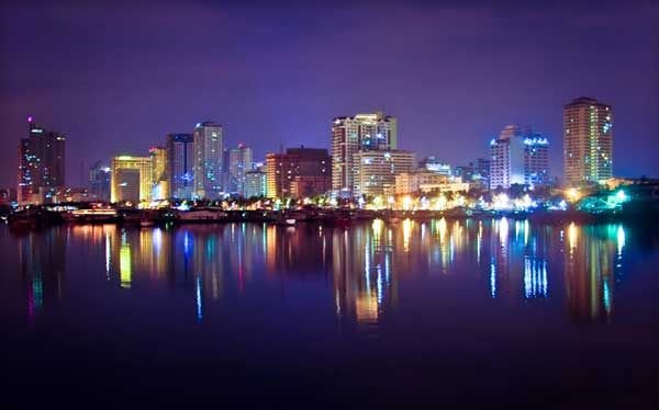 Manila Philippines skyline city lights and waterfront